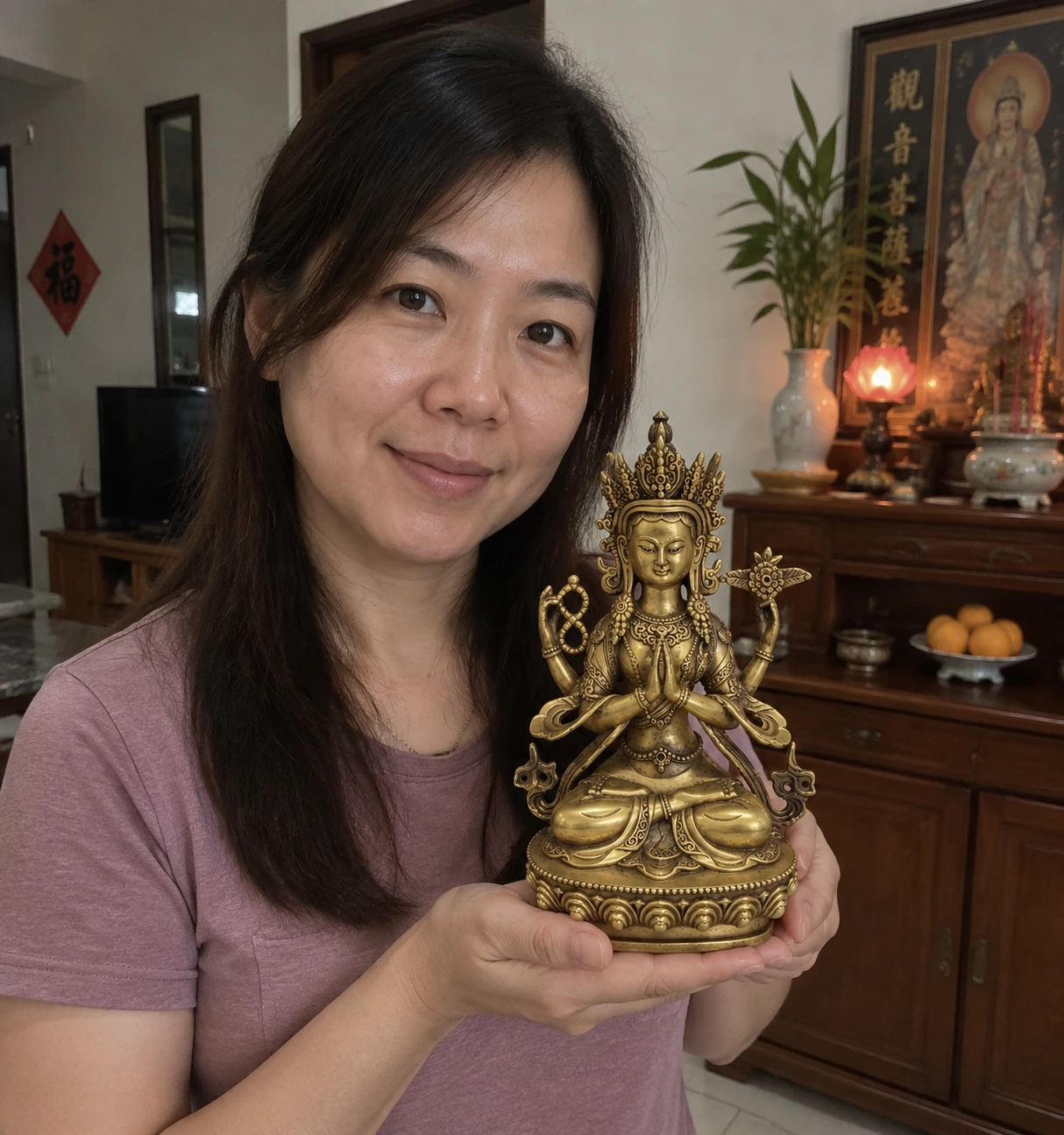 Four-Armed Avalokiteshvara Copper Statue – Compassion and Protection 22 cm held in a home setting