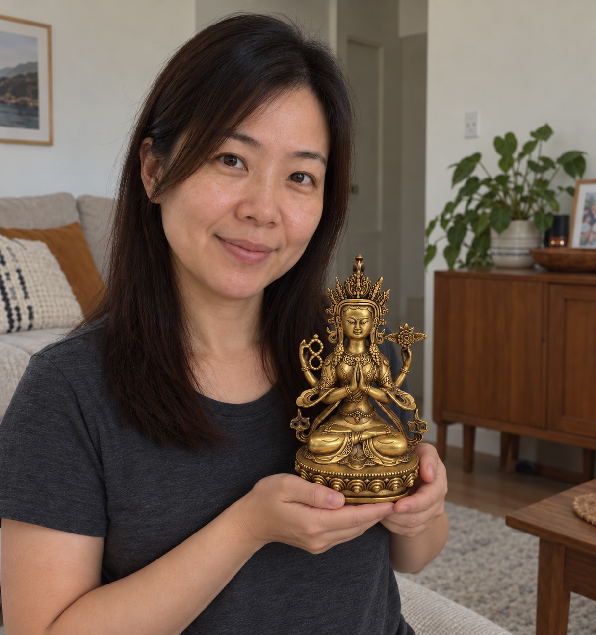 Four-Armed Avalokiteshvara Copper Statue – Compassion and Protection 22 cm held in a home setting