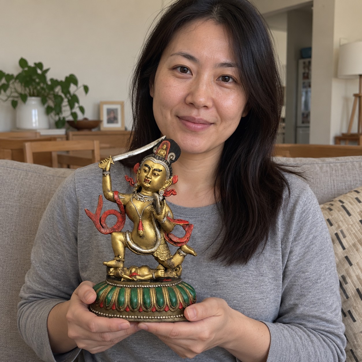 Manjushri (文殊菩萨) Copper Statue – Wisdom & Clarity · 28.5 cm held by a woman in an Australian home